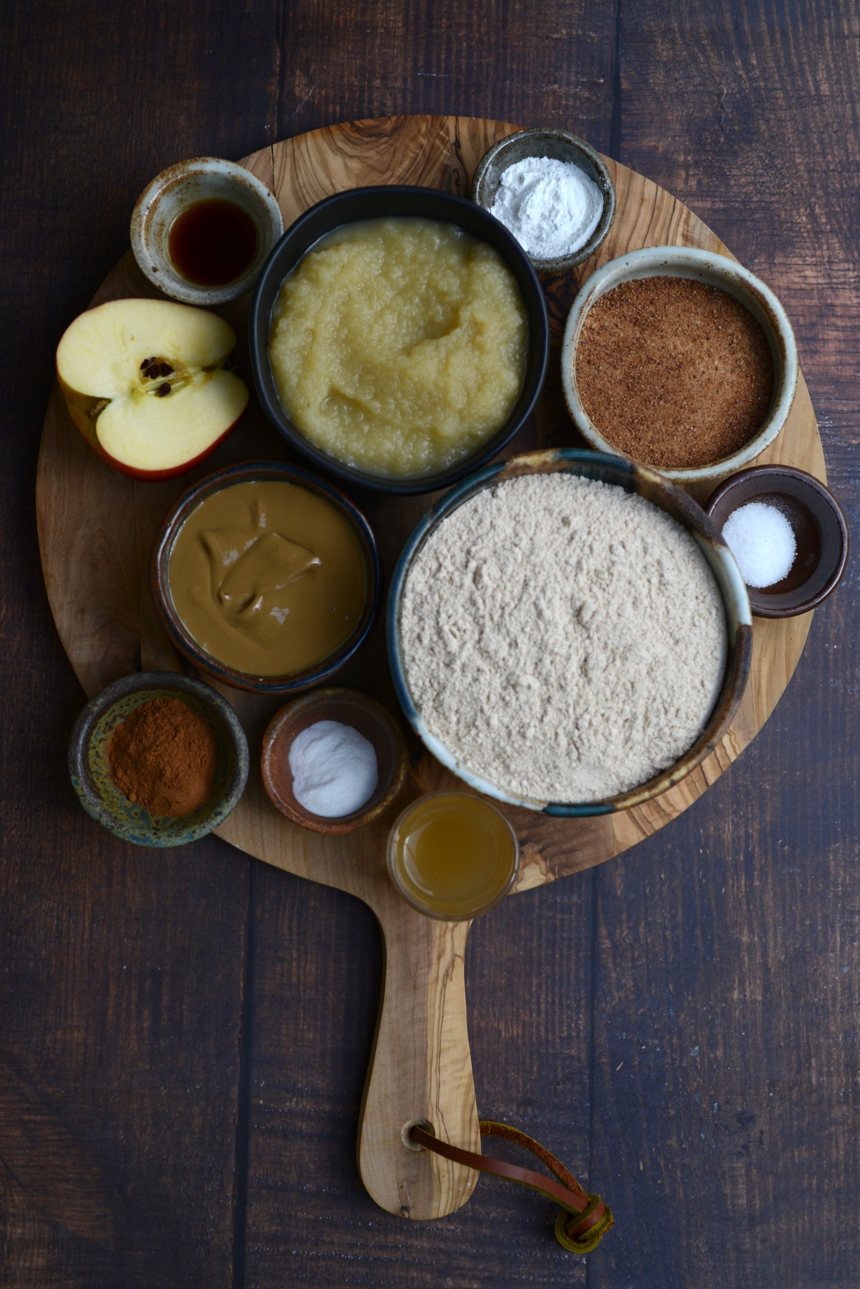 ingredients for vegan apple bread on wooden cutting board